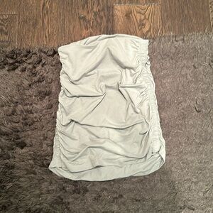 Light Green tight skirt. Very ruffled